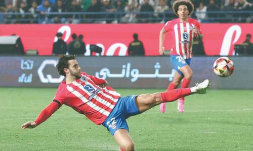 Last-gasp goals help Real edge Atletico, reach Super Cup final