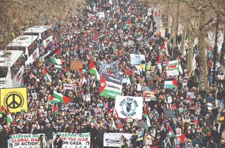 Thousands march in London on &lsquo;day of action&rsquo;