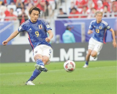 Japan beat Indonesia to seal last-16 spot, Iraq win thriller