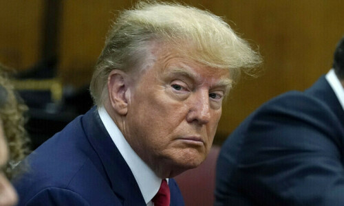 Trump judge sets March date for historic criminal trial