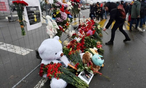 Russia mourns as toll from concert hall massacre climbs to 137 Russia mourns as toll from concert hall massacre climbs to 137