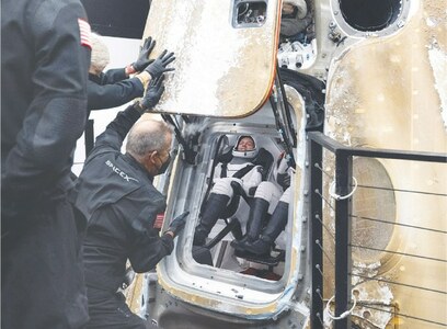 Astronauts return after vital experiments in space