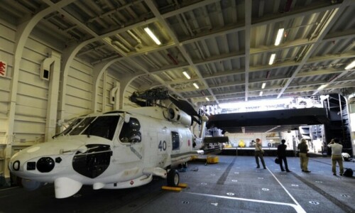 1 dead, 7 missing after two Japanese military helicopters crash 1 dead, 7 missing after two Japanese military helicopters crash