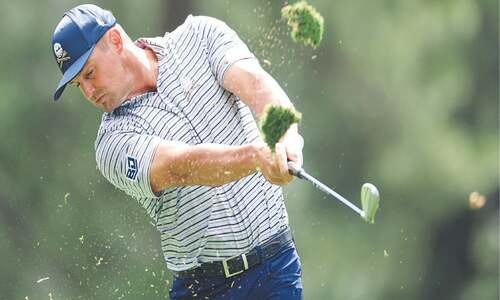 DeChambeau storms into Masters lead, Scheffler one back