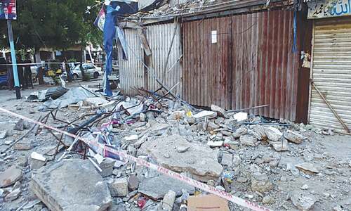Man dies, four hurt as part of building collapses Man dies, four hurt as part of building collapses
