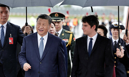 Xi lauds ties with France as Macron prepares to talk trade