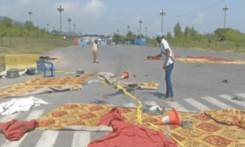 Two killed, four injured in Islamabad as car runs over protesters in their sleep Two killed, four injured in Islamabad as car runs over protesters in their sleep