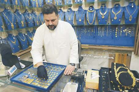 Gold hits record high as Iran shock triggers haven support