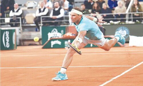Nadal out of possible last French Open, Swiatek through