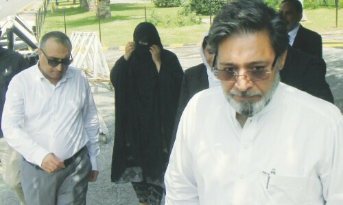 Arrest warrants for Khawar Maneka, son in land grab case Arrest warrants for Khawar Maneka, son in land grab case