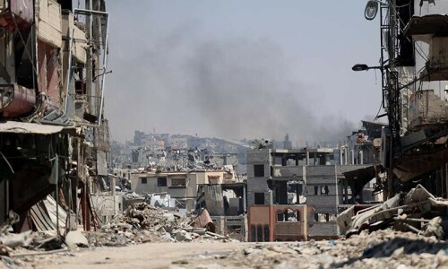 PHOTO: Palestinians flee as Israel bombards Gaza&rsquo;s Shujaiya district