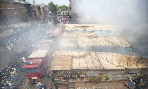 Fire destroys 80 shops, injures three people in Peshawar