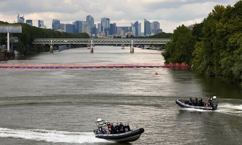 French sports minister swims in the Seine in boost for Olympics French sports minister swims in the Seine in boost for Olympics