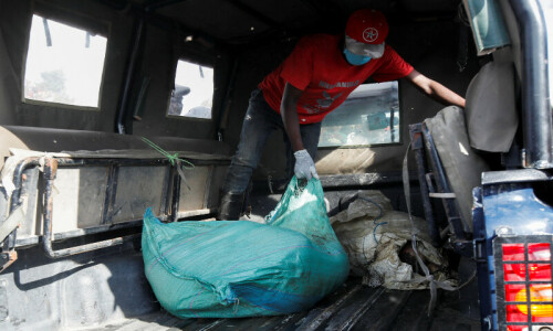 Kenyan police search dumpsite after mutilated bodies found Kenyan police search dumpsite after mutilated bodies found