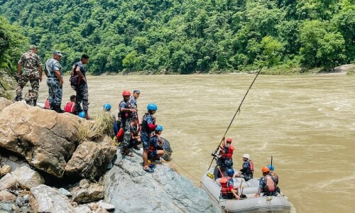 Nepal retrieves more bodies from buses swept away by landslide