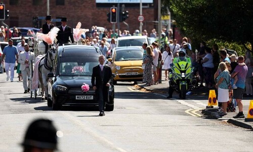 End UK riots, parents of murdered girl urge at her funeral