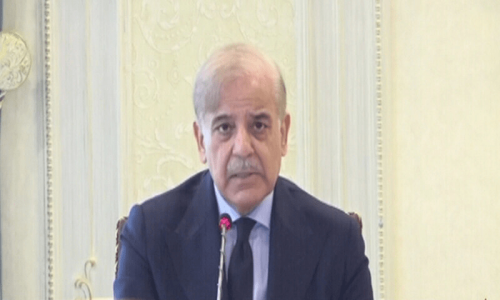 PM shows mailed fist to militants, offers talks too