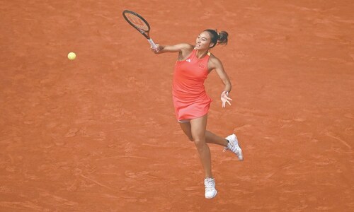 Beaming Biles bags gymnastics triple as Zheng, Evenepoel make history