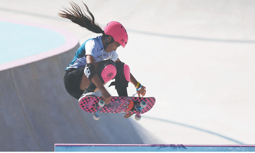 Quan dives to third gold as Trew rules the park