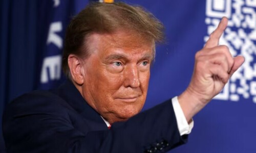 Trump sharpens anti-migrant attacks as both candidates visit key states