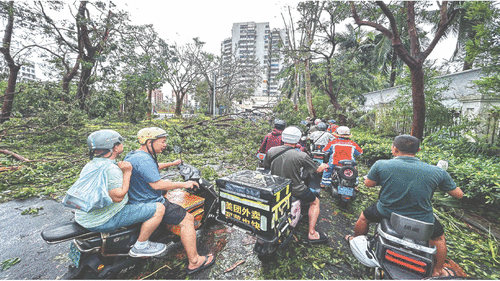 Monstrous typhoon tears through Philippines  and China, kills 22