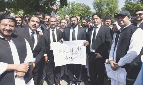 PTI lawyers protest outside SC against constitutional court