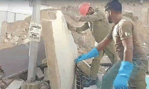 Two die as wall of under-construction hospital collapses