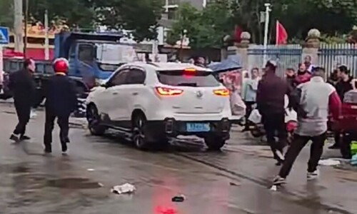 Car rams into students outside school in China Car rams into students outside school in China