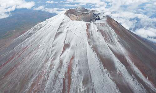 Snow seen on Mount Fuji after record absence