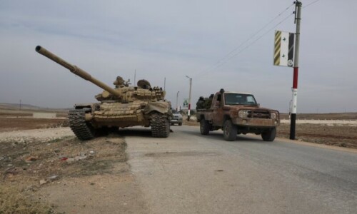 Syrian rebel assault widens as Assad races to defend Homs, Damascus