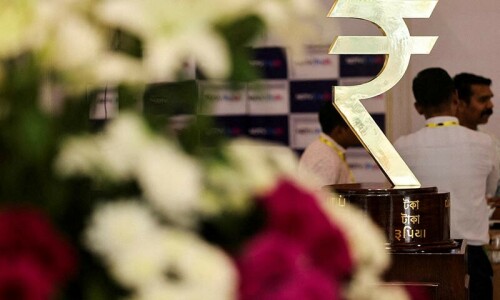 Indian rupee hits record low, bonds rise as change of guard at India&rsquo;s central bank spurs rate cut bets