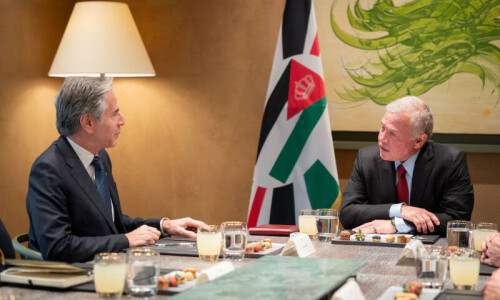 New Syrian govt suspends constitution and parliament