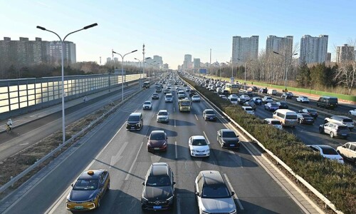 China says to raise deficit, boost spending next year