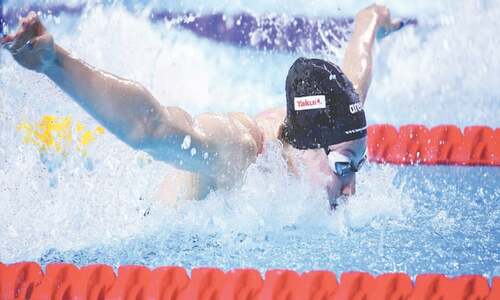 Walsh leads continued attack on records at short-course worlds