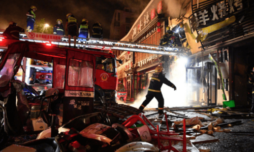 Market fire kills eight in China Market fire kills eight in China