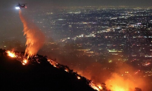 Whole streets burn as fires rage around Los Angeles Whole streets burn as fires rage around Los Angeles