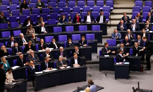 German MPs pass motion backed by far-right to limit immigration