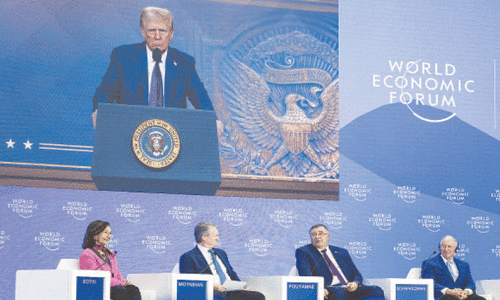 Trump tells Davos elite: produce  in US or pay tariffs