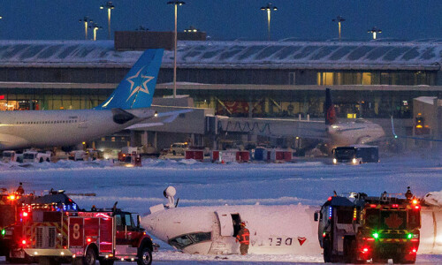 Delta plane flips upside down on landing at Toronto airport, injuring 18