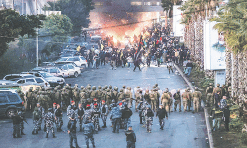 Tear gas fired at Hezbollah supporters as Lebanon blocks Iranian flight