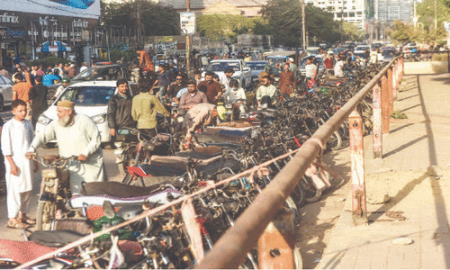 Despite abolition, charged parking still plagues Karachi