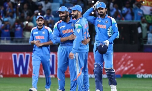 Chakravarthy stars as India set up Champions Trophy clash with Australia
