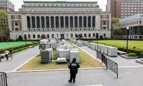 Columbia University head steps down after feud with Trump
