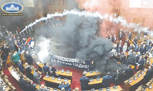 Serbian opposition lawmakers throw smoke grenades in parliament Serbian opposition lawmakers throw smoke grenades in parliament