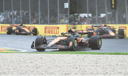 Norris holds off Verstappen to secure rain-hit Australian GP