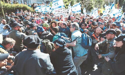 Opposition to Israeli PM finds voice as conflict returns to Gaza