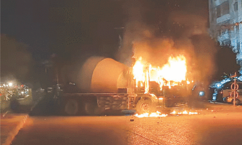 Heavy vehicles claim lives of two bike-riders; cement mixer torched
