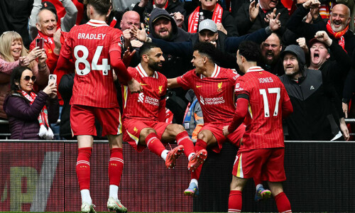 Liverpool within touching distance of title, Wolves add to Spurs woe