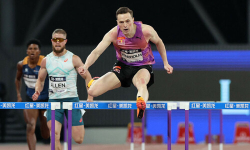 Warholm sets hurdles world record in Xiamen, Holloway shocked