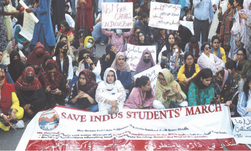 Students march against canals project